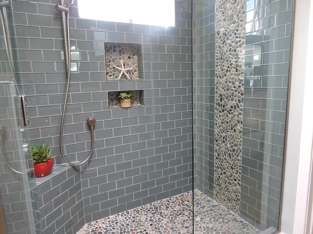 Accent Tile Sticks Out In The Shower, Glass Accent Tile